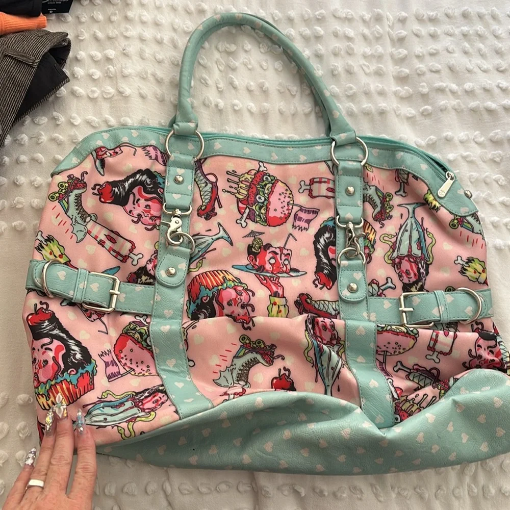 Iron Fist Pink and Blue Travel Bags with Whimsical Design - Picture 4 of 5